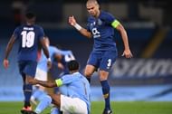 Porto's Pepe fouls Manchester City's Raheem Sterling to give away a penalty to the home side.